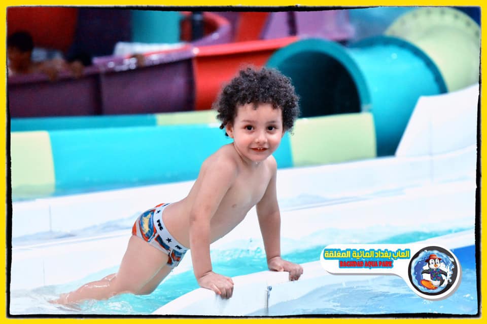 Child enjoying water slides